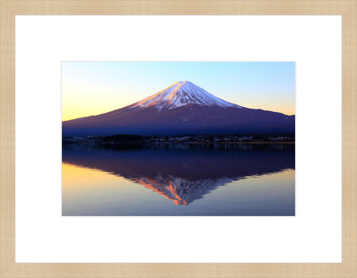 The reddish mountain Fuji and reflection
