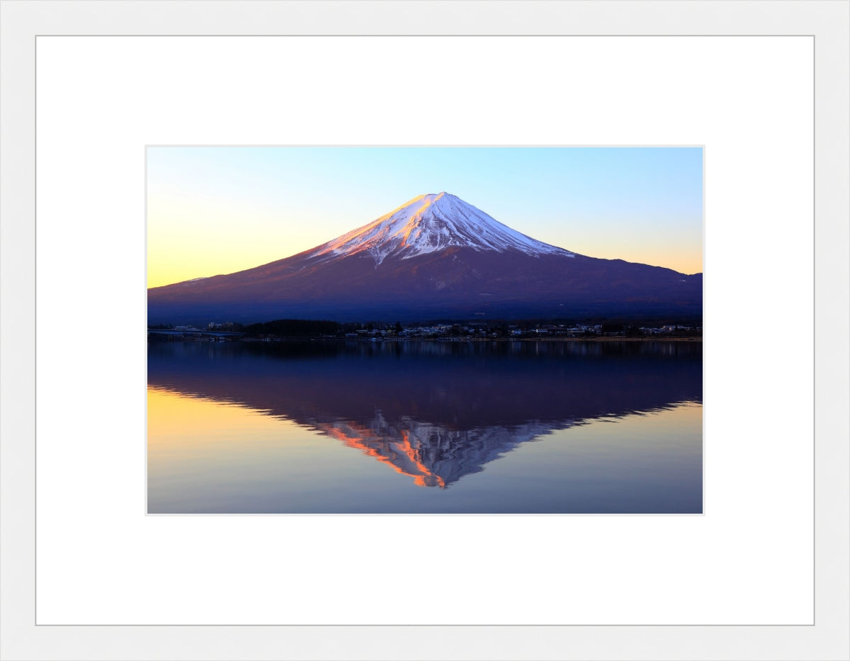 The reddish mountain Fuji and reflection
