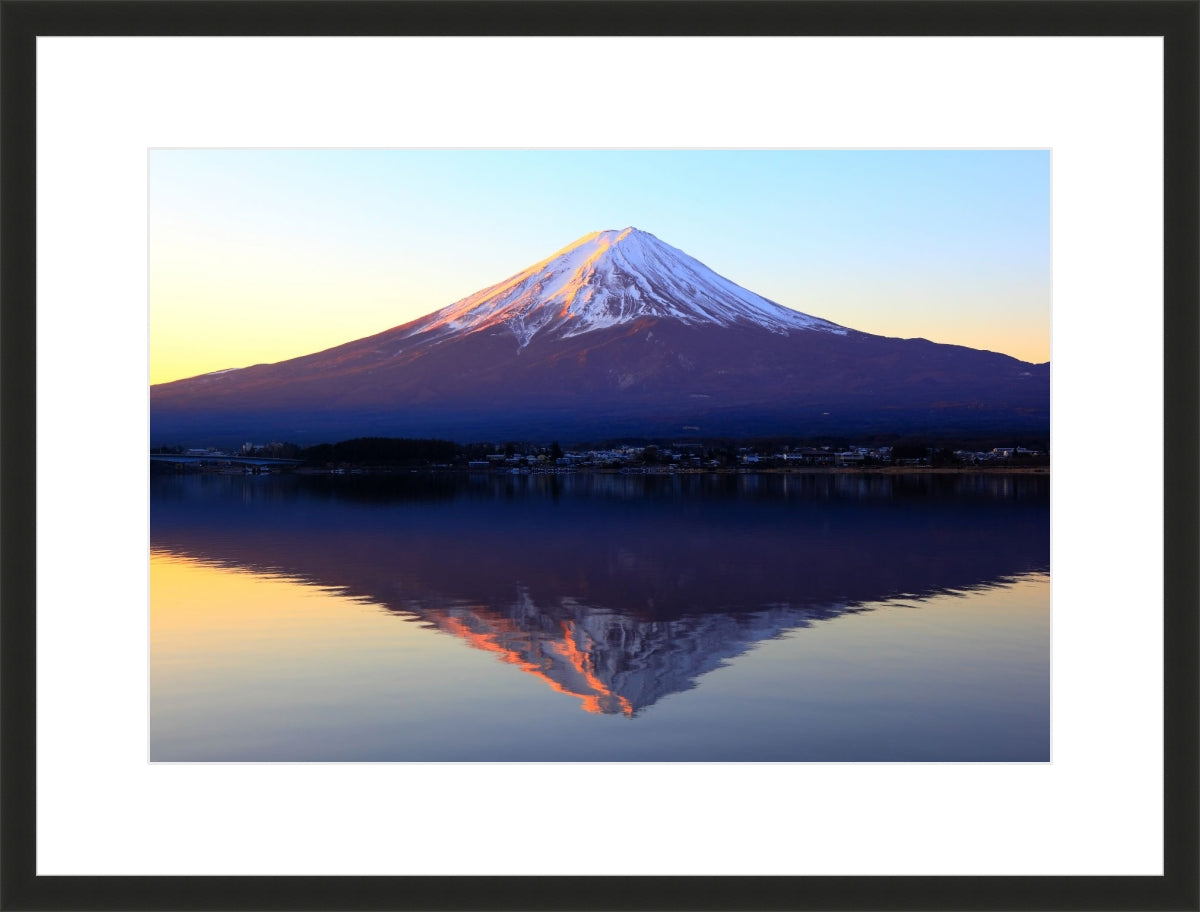 The reddish mountain Fuji and reflection