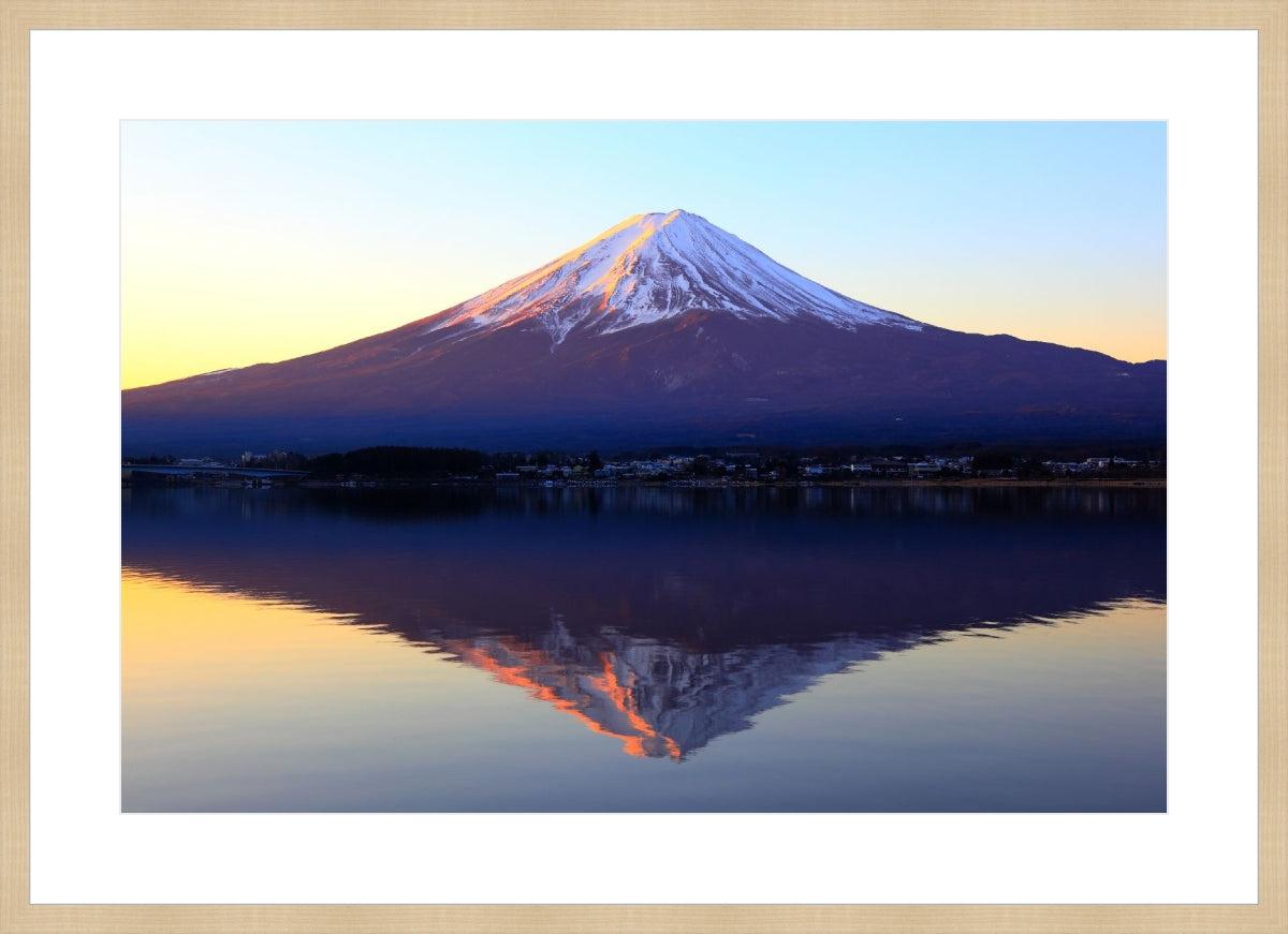 The reddish mountain Fuji and reflection