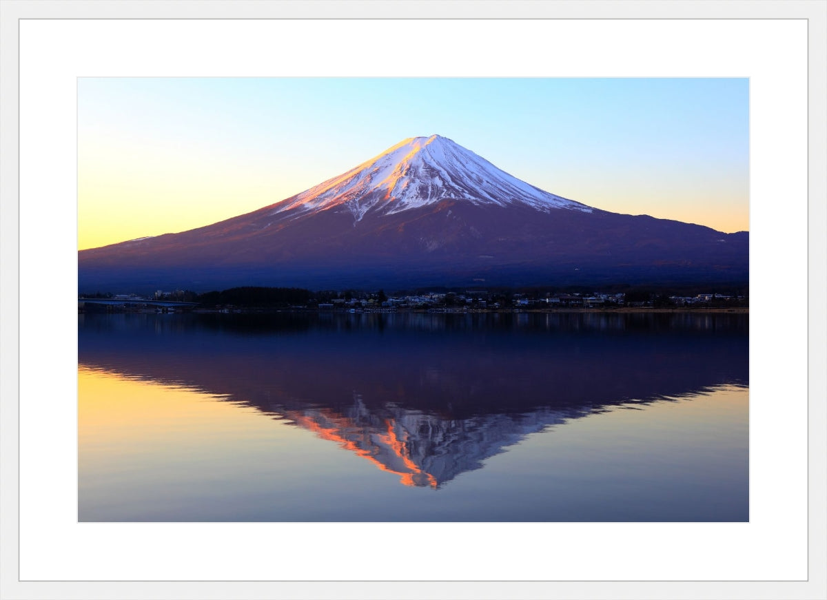 The reddish mountain Fuji and reflection
