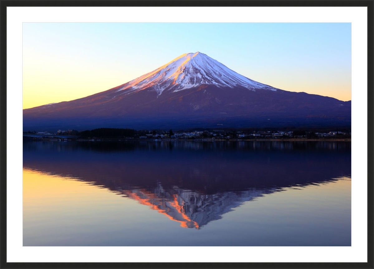 The reddish mountain Fuji and reflection
