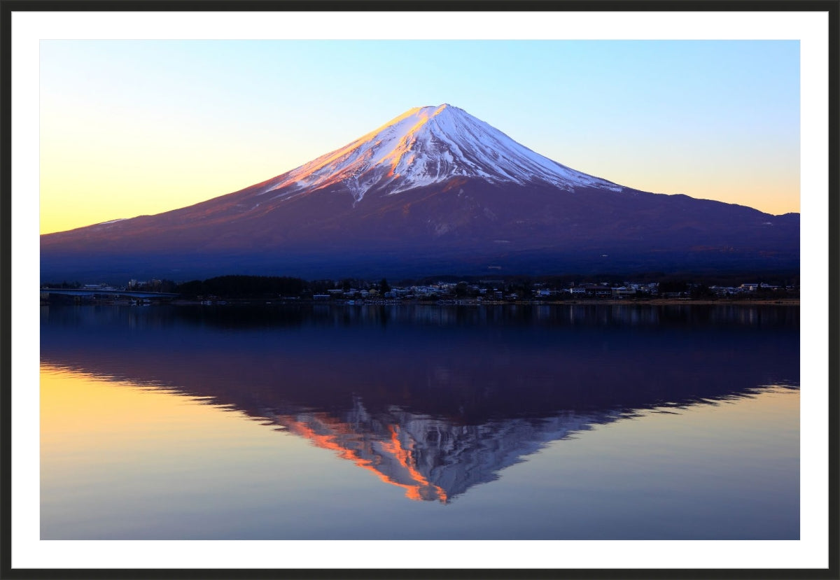 The reddish mountain Fuji and reflection