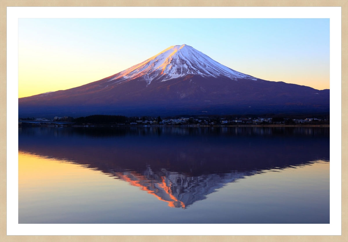 The reddish mountain Fuji and reflection