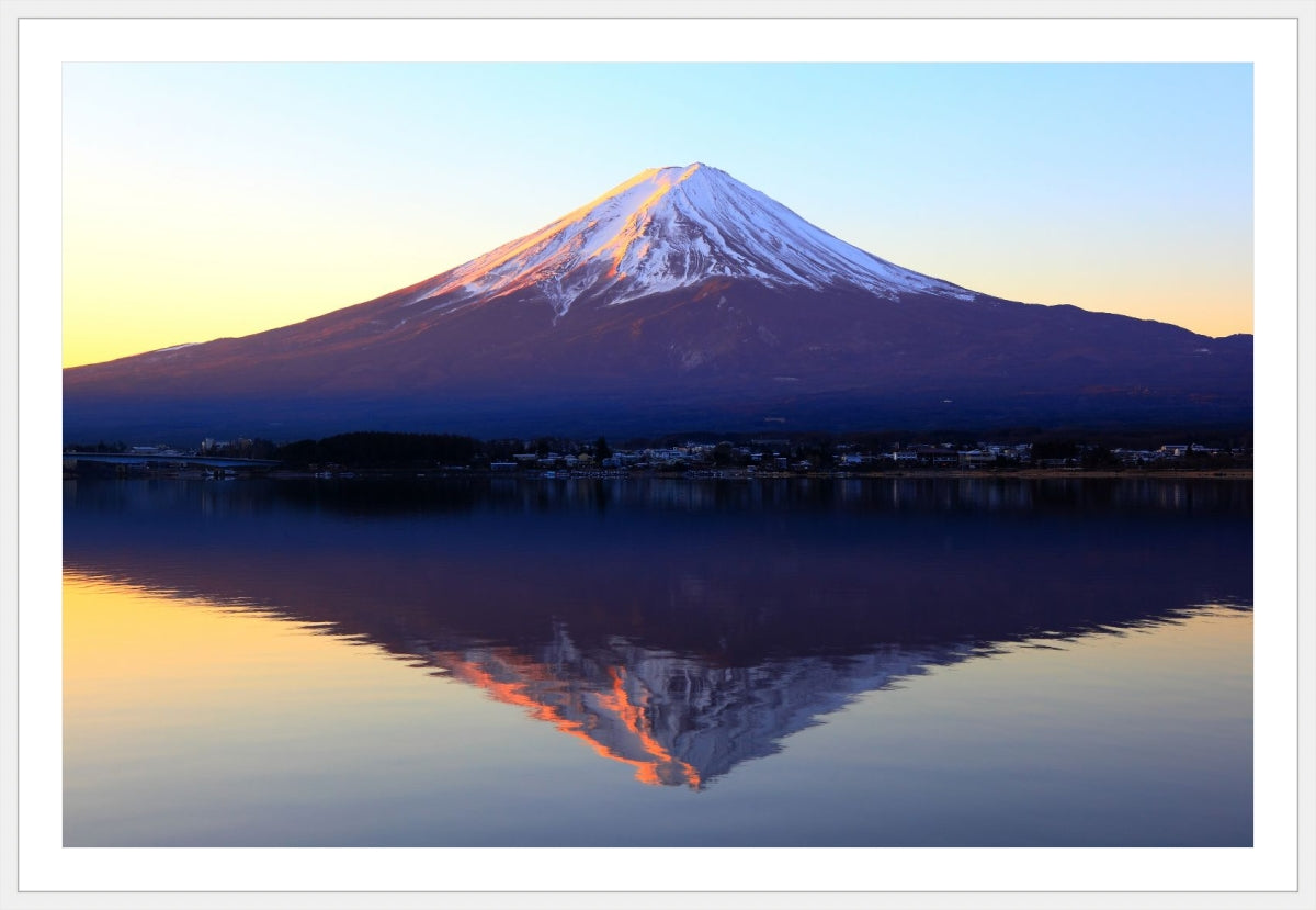 The reddish mountain Fuji and reflection